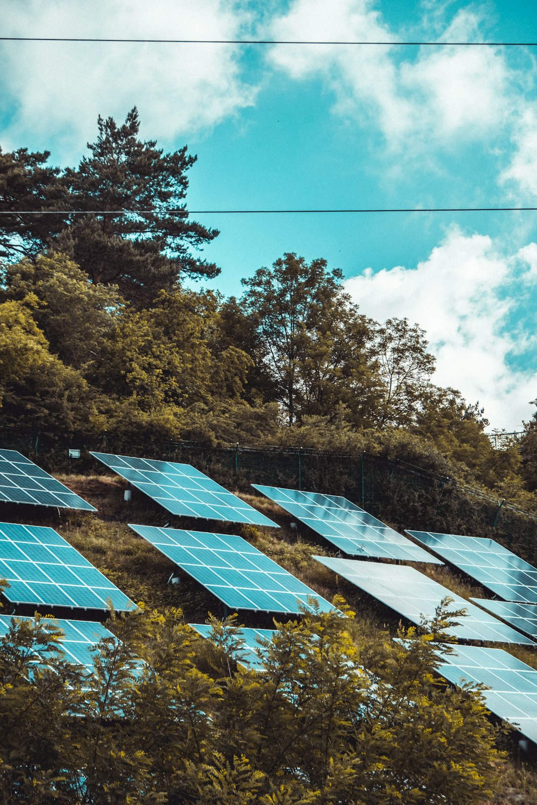 our-mission solar-panels-on-green-grass-field-gd8io0e4ozm